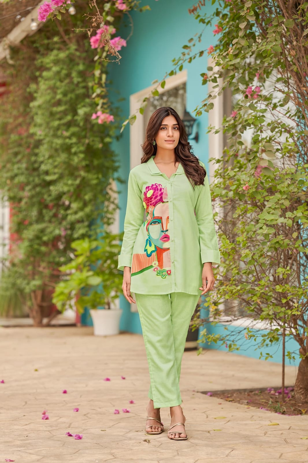 Peach colour co-ord set with figure on top